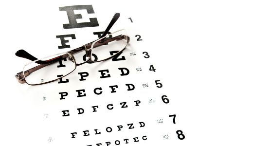 a vision chart and eyeglasses